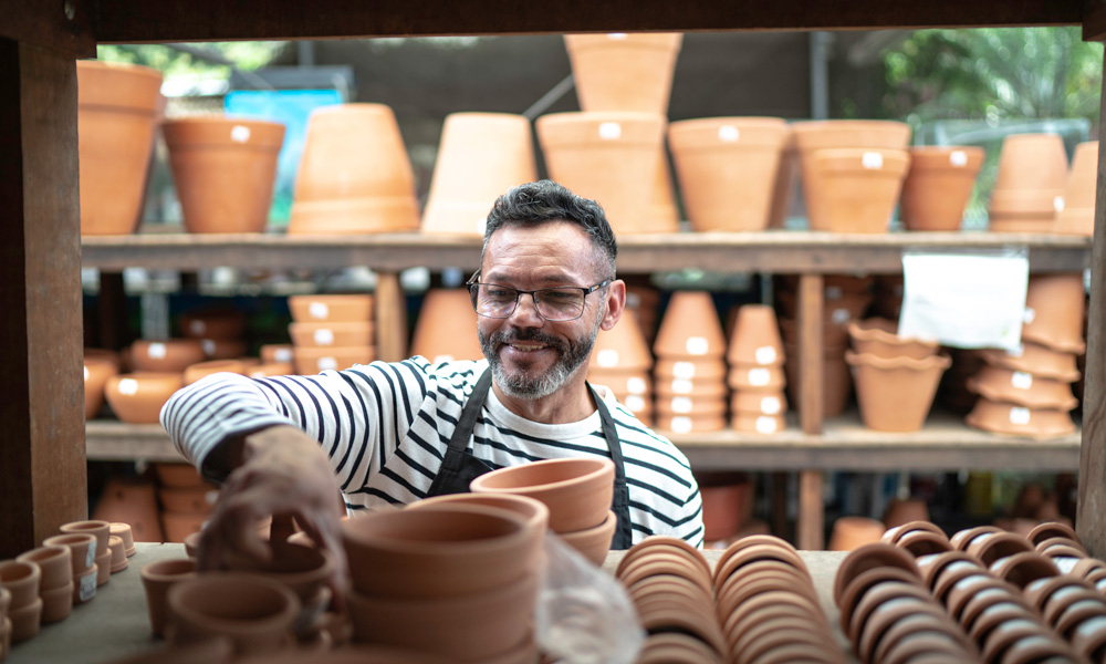 Staff working with inventory in a garden store